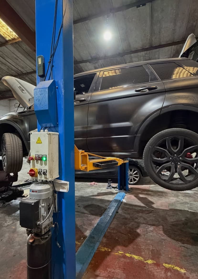 Mechanic working on a car